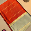 Vairaoosi Soft Silk Saree with Contrast Border & Running Blouse – Vermilion Red & Silver Gold