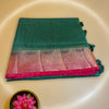 Premium Jute Silk Saree in Bottle Green with Pink Zari Border