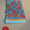 Floral Fancy Cotton Saree in Sky Blue with Red and Orange Print and Golden Border