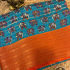 Mishri Marshmallow Georgette Saree with Elephant Print and Contrast Orange Border