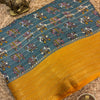 Mishri Marshmallow Georgette Saree with Elephant Print and Contrast Mustard Border
